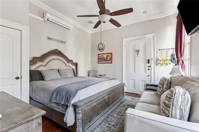 bedroom with dark hardwood / wood-style floors, an AC wall unit, ceiling fan, and crown molding