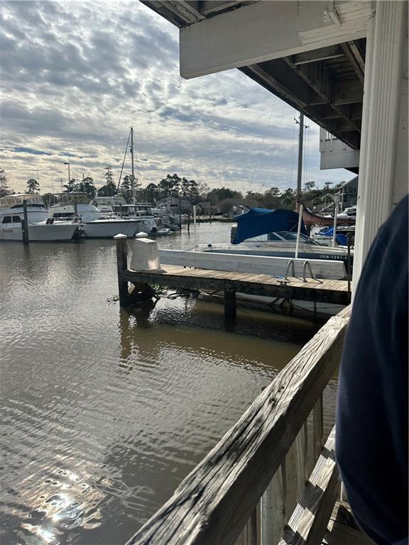 dock area featuring a water view