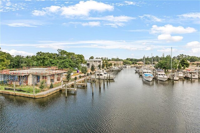 969 Marina Blvd Unit 969, Mandeville, LA 70471 - property view of water featuring a dock