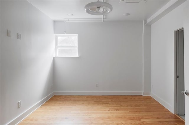 bedroom with visible vents, wood finished floors, and recessed lighting