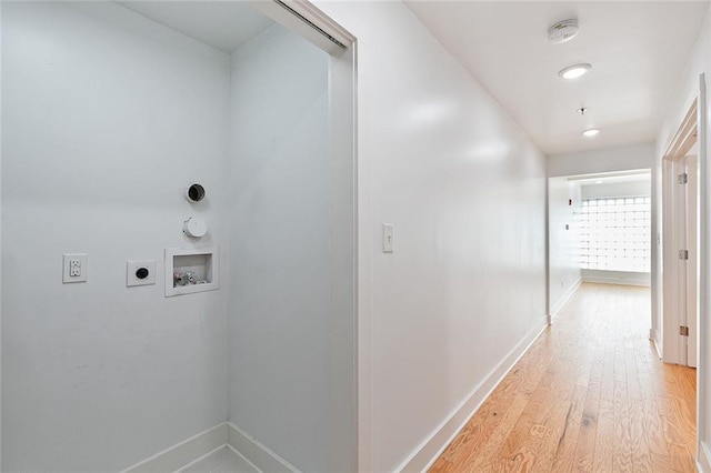 bathroom with a spacious closet and vanity
