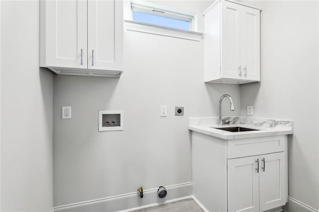 laundry room featuring electric dryer hookup, cabinets, sink, and washer hookup