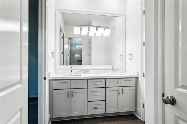 bathroom featuring vanity and wood-type flooring