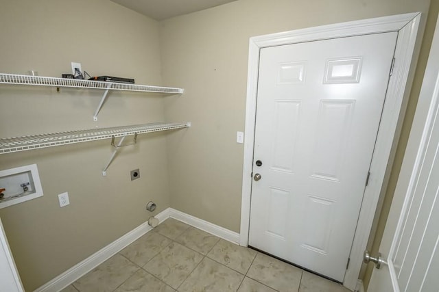 clothes washing area with hookup for an electric dryer, light tile patterned floors, and hookup for a washing machine