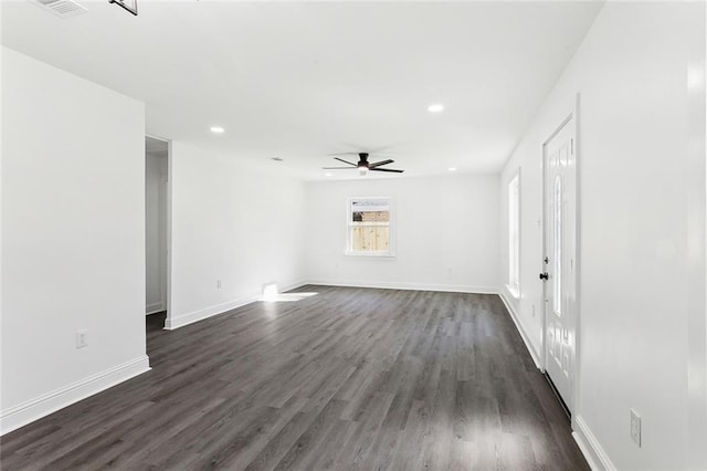 1917 Generes Dr, Harahan, LA 70123 - spare room featuring a ceiling fan, recessed lighting, dark wood-type flooring, and baseboards