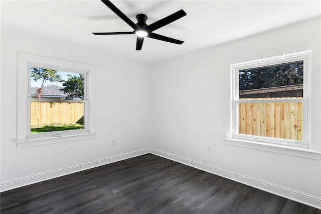 1917 Generes Dr, Harahan, LA 70123 - empty room with dark wood-type flooring, baseboards, and ceiling fan