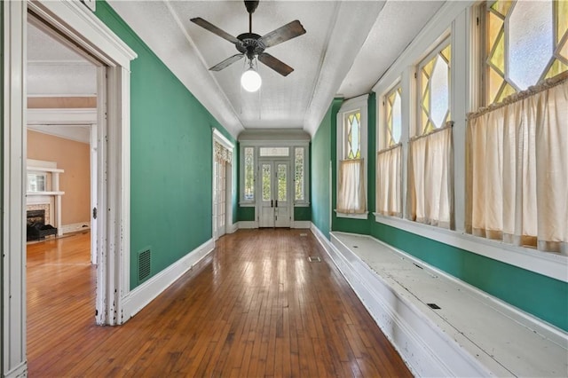 interior space featuring ceiling fan