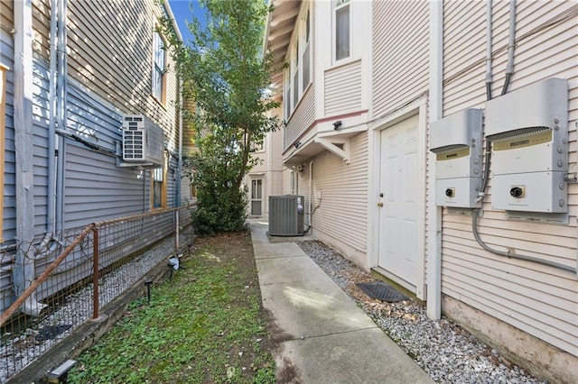 view of side of home featuring cooling unit