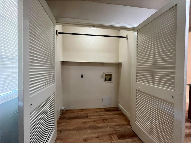 laundry room with hardwood / wood-style flooring, washer hookup, and hookup for an electric dryer