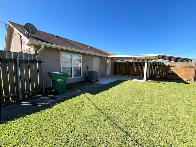 view of yard featuring central AC