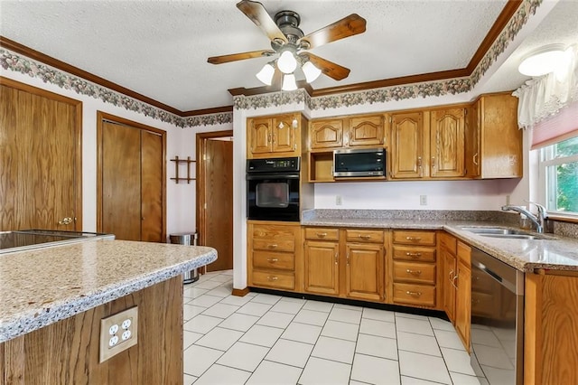 kitchen featuring sink, stainless steel appliances, a textured ceiling, and ornamental molding