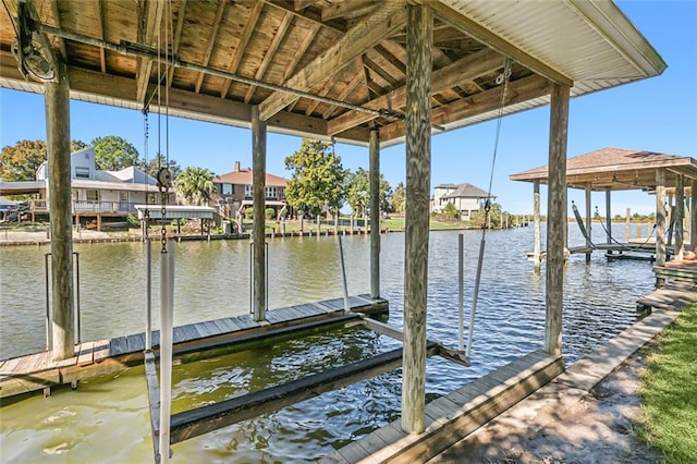 dock area featuring a water view