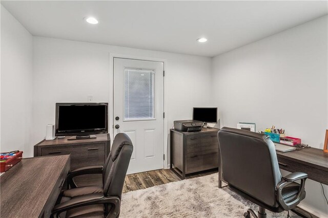 office space featuring dark wood-type flooring