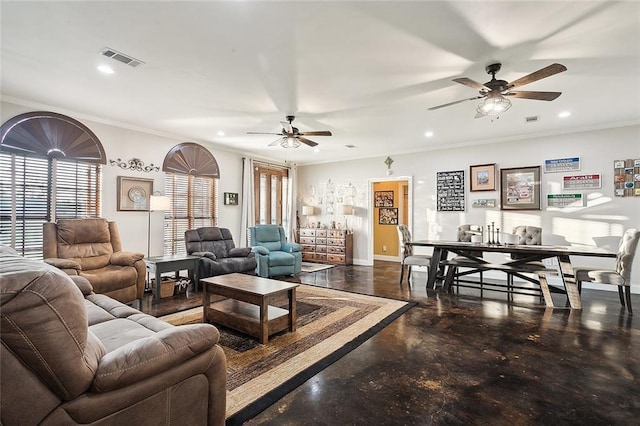 living room with ceiling fan and crown molding