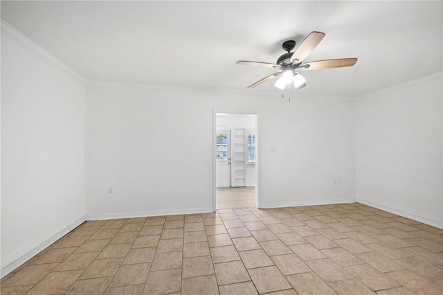 unfurnished room featuring ceiling fan and crown molding