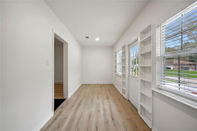 hall featuring light wood-type flooring