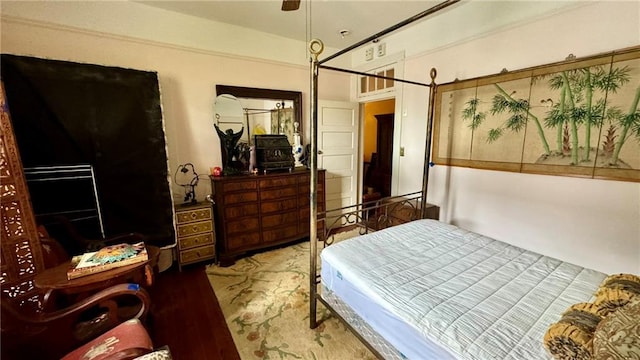 bedroom featuring hardwood / wood-style floors