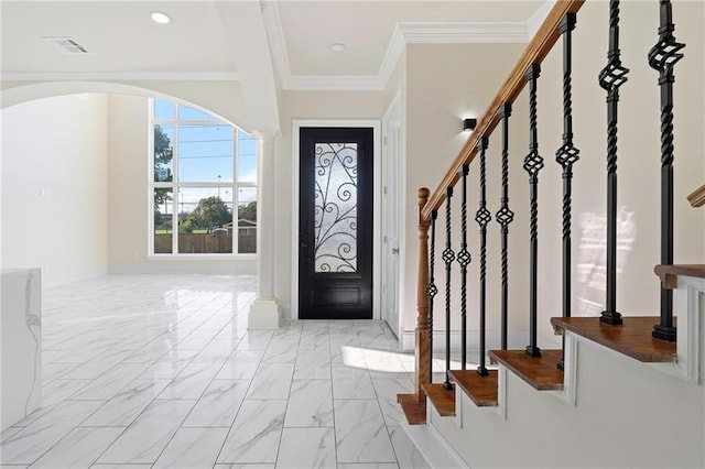 entrance foyer with crown molding