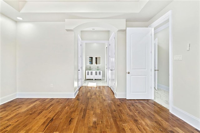 corridor featuring hardwood / wood-style flooring