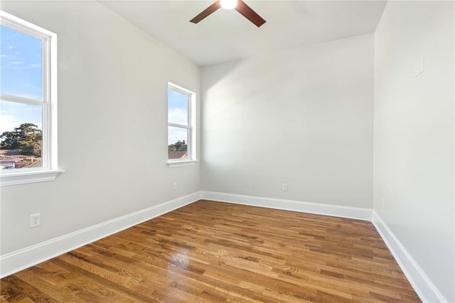 unfurnished room featuring ceiling fan and wood-type flooring