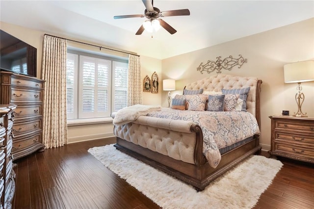 bedroom featuring dark hardwood / wood-style floors and ceiling fan