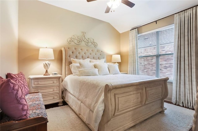 bedroom featuring ceiling fan and lofted ceiling