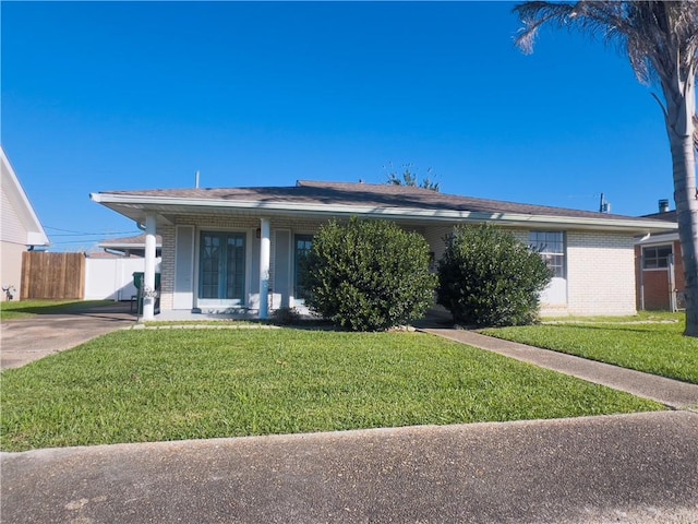 ranch-style house with a front yard