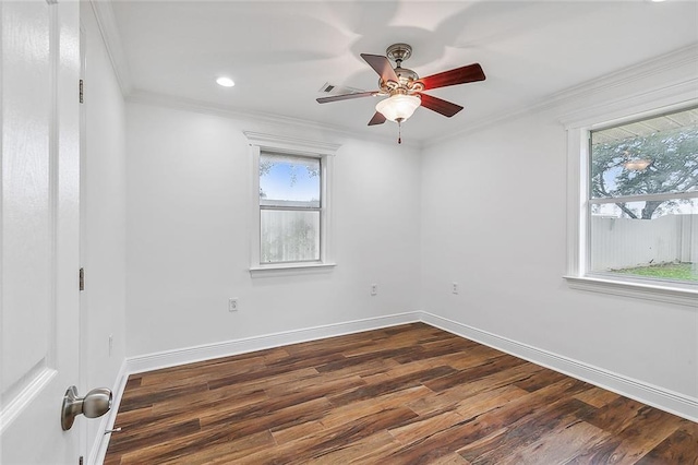 unfurnished room with ceiling fan, dark hardwood / wood-style flooring, and ornamental molding