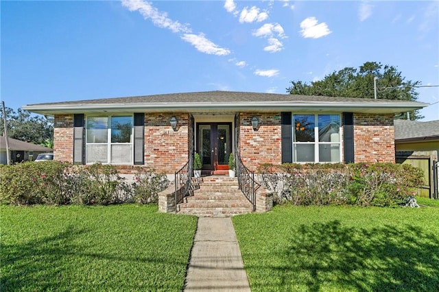 view of front facade featuring french doors and a front yard