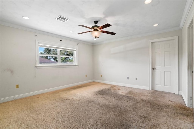 empty room with carpet, ceiling fan, and crown molding