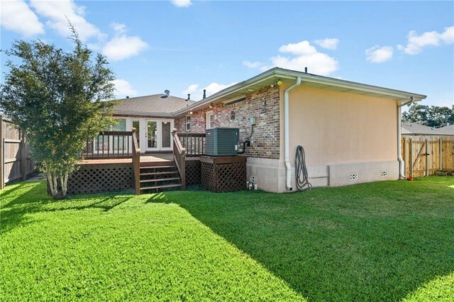 136 Rebel Ave, River Ridge, LA 70123 - back of house with cooling unit, a deck, brick siding, and crawl space