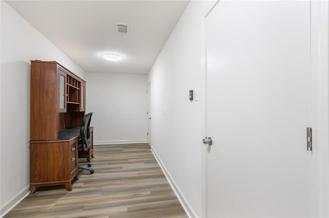 office space featuring light wood-type flooring