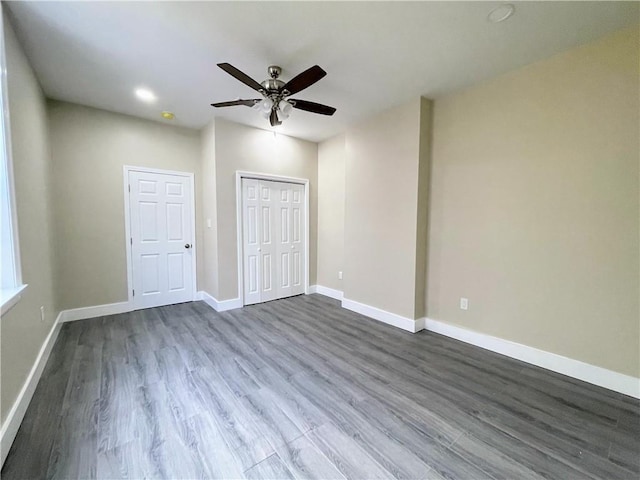 unfurnished bedroom with hardwood / wood-style flooring and ceiling fan