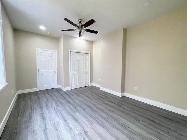 343335 Magnolia St, New Orleans, LA 70115 - unfurnished bedroom featuring dark wood-style floors, a closet, recessed lighting, and ceiling fan