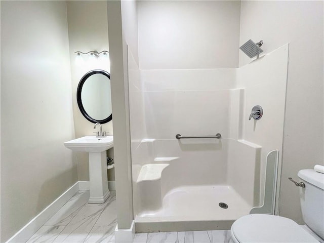 343335 Magnolia St, New Orleans, LA 70115 - full bathroom featuring marble look tile flooring and a shower stall