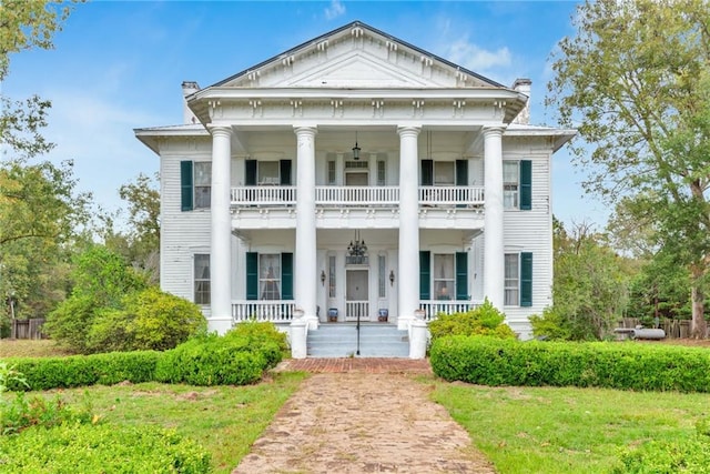 2513 Red Lick Rd, Lorman, MS 39096 - neoclassical / greek revival house with a balcony, a porch, and a chimney