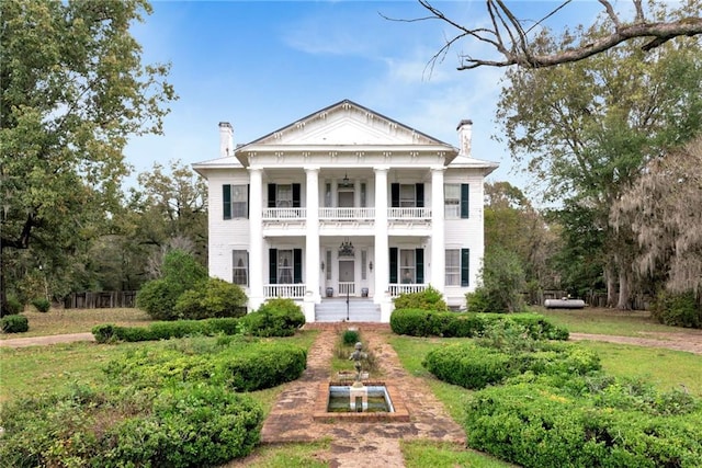 2513 Red Lick Rd, Lorman, MS 39096 - greek revival inspired property featuring a balcony, a porch, and a chimney