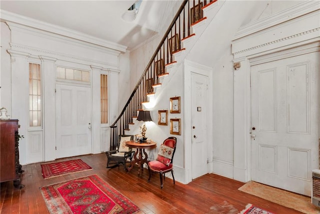 2513 Red Lick Rd, Lorman, MS 39096 - foyer featuring hardwood / wood-style floors, stairs, and crown molding