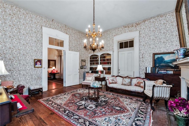 2513 Red Lick Rd, Lorman, MS 39096 - living area with wallpapered walls, a chandelier, hardwood / wood-style flooring, and crown molding