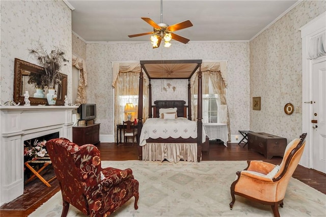 2513 Red Lick Rd, Lorman, MS 39096 - bedroom with wallpapered walls, ornamental molding, wood finished floors, and a fireplace