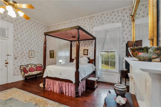 2513 Red Lick Rd, Lorman, MS 39096 - bedroom featuring hardwood / wood-style flooring, wallpapered walls, ornamental molding, and a ceiling fan
