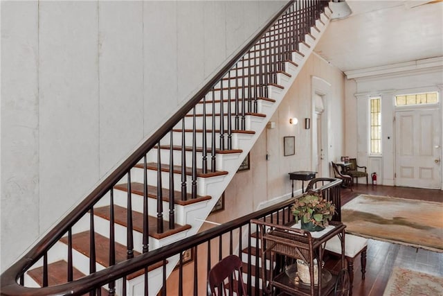 2513 Red Lick Rd, Lorman, MS 39096 - stairs featuring wood-type flooring and ornamental molding