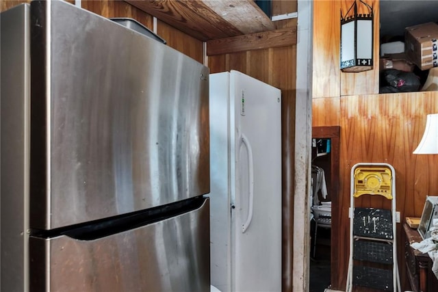 2513 Red Lick Rd, Lorman, MS 39096 - kitchen featuring freestanding refrigerator and brown cabinets