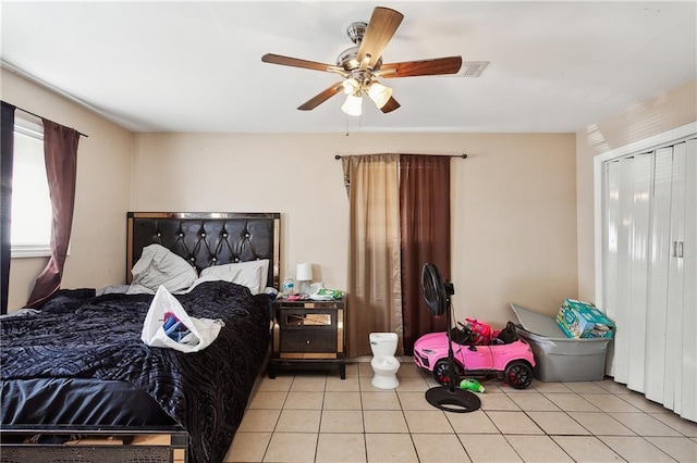 bedroom featuring ceiling fan and light tile patterned floors