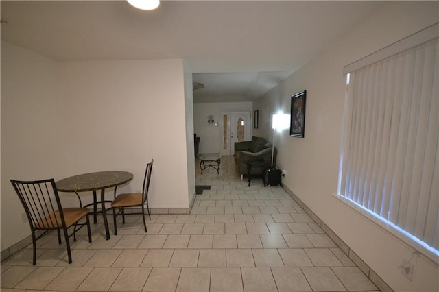 hallway with light tile patterned flooring