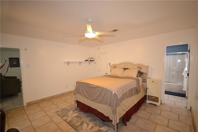 bedroom with connected bathroom, ceiling fan, and light tile patterned floors