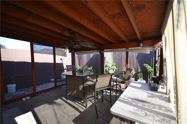 view of patio featuring ceiling fan