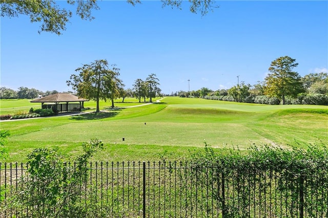 view of home's community featuring a lawn