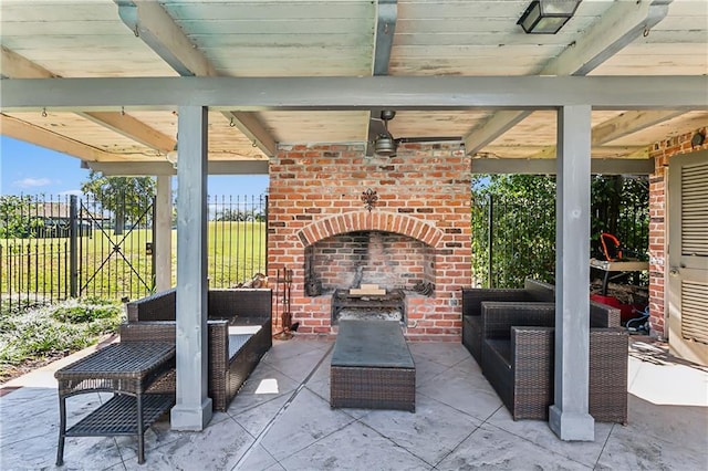 view of patio / terrace featuring an outdoor living space with a fireplace