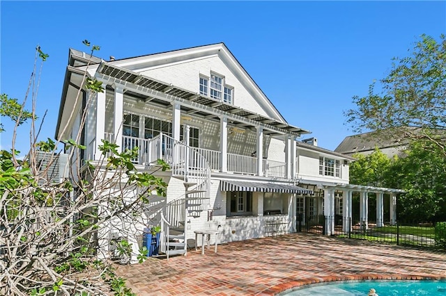 rear view of house with a patio area